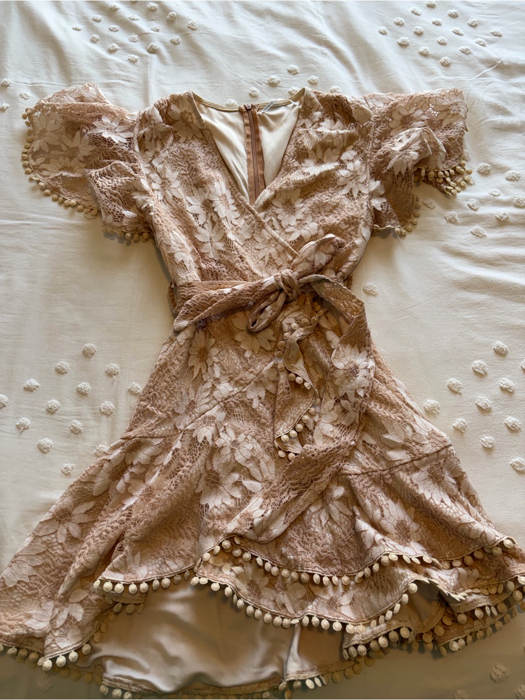 Womenâs Blush Lace Wrap Mini Dress With Pom Trim